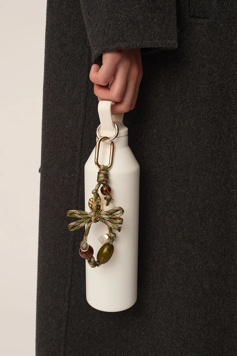 Des Petits Hauts Palma Bag Charm - Close-Up of Knotted Cord and Semi-Precious Rose Quartz and Labradorite Stone Detail