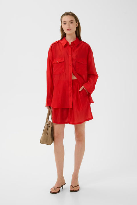 Gestuz Siora Shirt in Tomato - Close-Up of Flap Chest Pocket and Visible Placket Stitching Detail