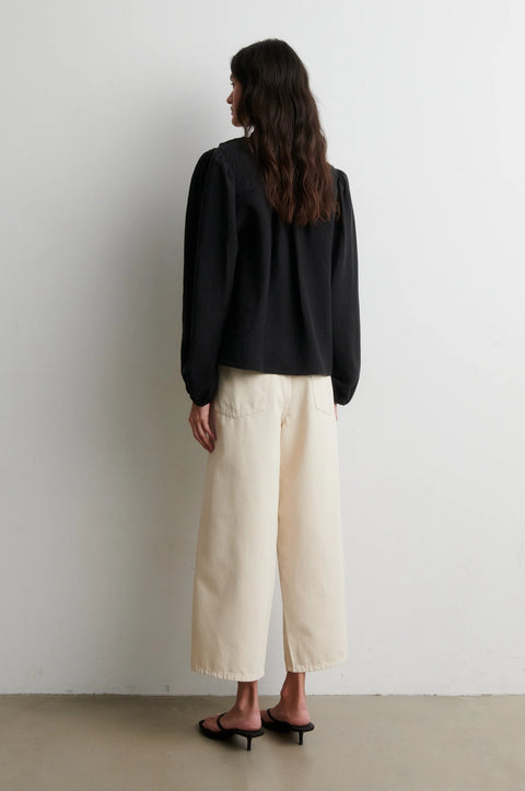 Second Female Rayna Frill Blouse in Black - Close-Up of Ruffle Trim Detail and Textured Crinkled Lyocell Fabric