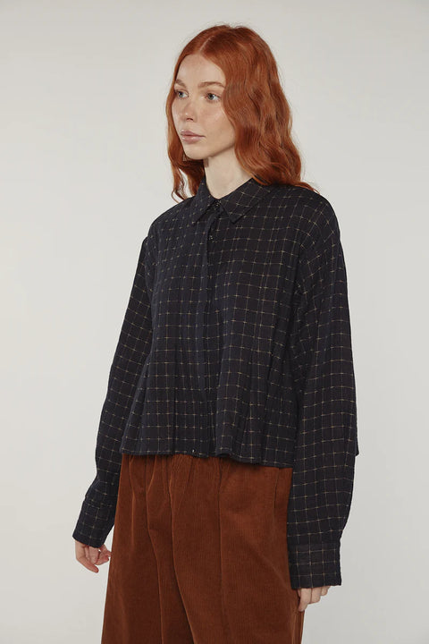 Black blouse made from 100% cotton, delicate pleats, straight silhouette, simple neckline with collar. Amente Cotton Pleated Blouse in Black