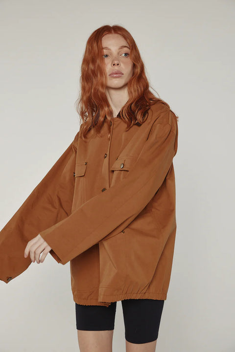 Durable cotton jacket, worker jacket style with buttons down the front, boxy fit, patch pockets, 100% cotton. Amente Cotton Worker Jacket in Brown
