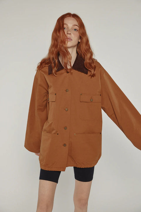Durable cotton jacket, worker jacket style with buttons down the front, boxy fit, patch pockets, 100% cotton. Amente Cotton Worker Jacket in Brown