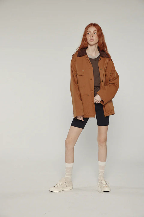 Durable cotton jacket, worker jacket style with buttons down the front, boxy fit, patch pockets, 100% cotton. Amente Cotton Worker Jacket in Brown