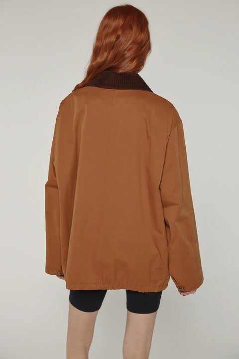 Durable cotton jacket, worker jacket style with buttons down the front, boxy fit, patch pockets, 100% cotton. Amente Cotton Worker Jacket in Brown