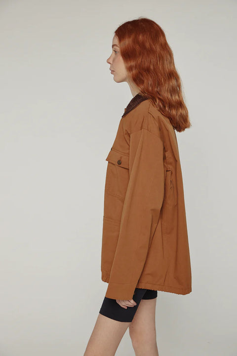 Durable cotton jacket, worker jacket style with buttons down the front, boxy fit, patch pockets, 100% cotton. Amente Cotton Worker Jacket in Brown