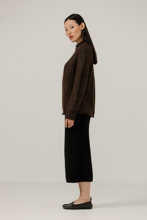 Dark brown sweater, oversized classic fit, made from alpaca and cotton, seamless rollback neckline, brand is Bare Knit