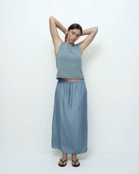 Blue knit tank angled front view sleeveless relaxed fit