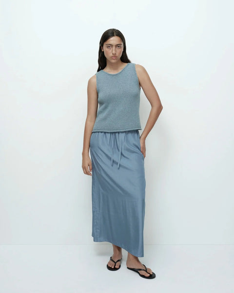 Blue boat neck knit tank front standing view minimal design