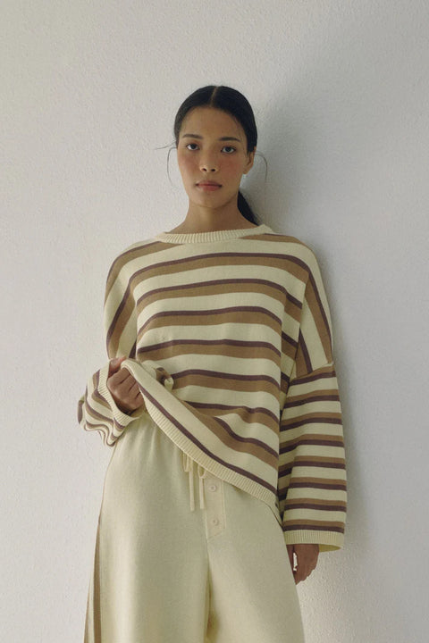 Cotton striped sweater in cream and beige brown, crew neck and ribbed detailing at the collar and cuff.