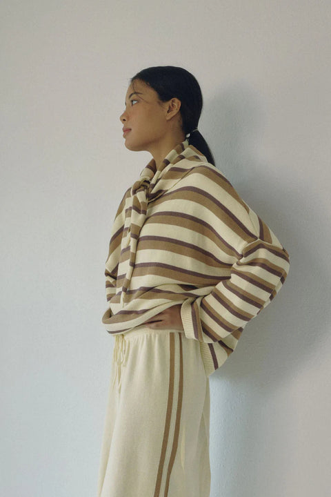 Cotton striped sweater in cream and beige brown, crew neck and ribbed detailing at the collar and cuff.
