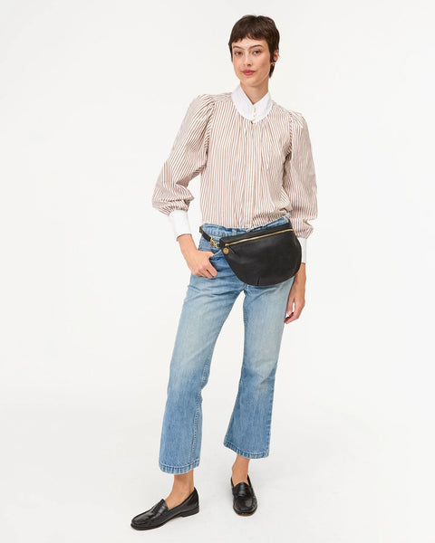 Fanny pack type purse, crossbody, bum bag, or shoulder bag - anything goes.
With a detachable, adjustable, interchangeable strap, made from unlined, perforated Italian leather.