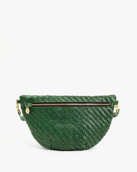 Fanny pack type purse, crossbody, bum bag, or shoulder bag. With a detachable, adjustable, interchangeable strap, made from unlined, perforated Italian leather.