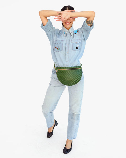 Fanny pack type purse, crossbody, bum bag, or shoulder bag. With a detachable, adjustable, interchangeable strap, made from unlined, perforated Italian leather.