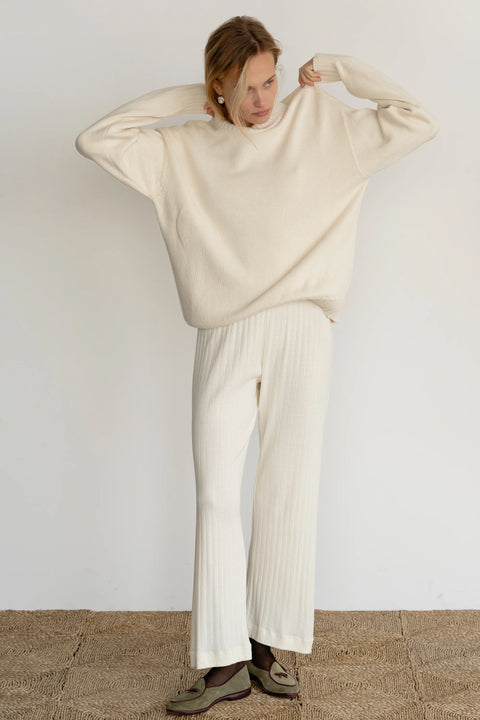 Cream cropped, cotton Lounge pant in Pointelle, easy elastic waistband and a cropped silhouette