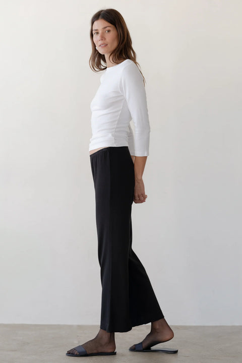 DONNI Baby Rib Scallop Pant in Jet - Back View of Black Cropped Knit Pant with Elastic Waistband