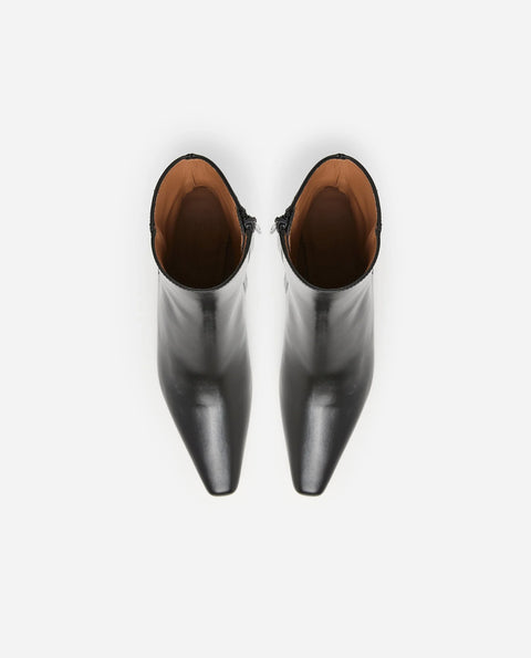 contoured heel, elongated toe, inner zip detailing and made from leather. 2.16” heel, classic shape and look.
