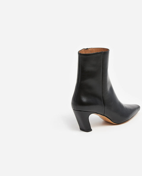 contoured heel, elongated toe, inner zip detailing and made from leather. 2.16” heel, classic shape and look.