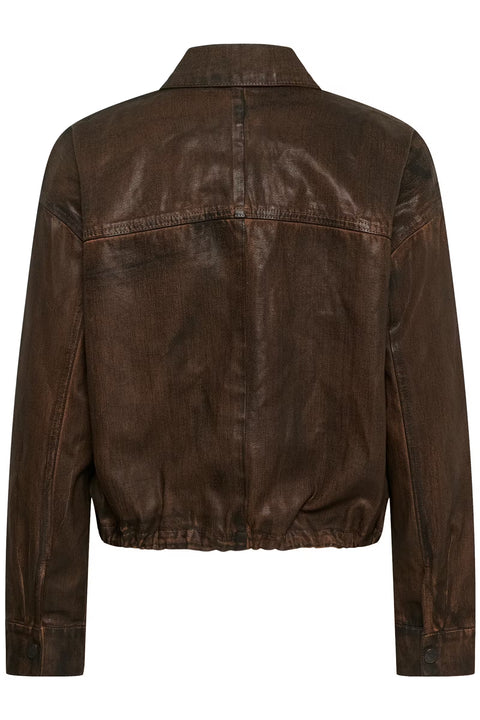 Chocolate brown coated denim jacket with a vintage waist-length cut, puckered hem, and snap buttons.