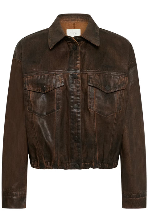 Chocolate brown coated denim jacket with a vintage waist-length cut, puckered hem, and snap buttons.