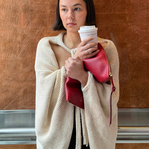 Oversized cardigan with open front and neck tie.