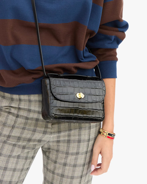 Clare V Kathryn Bag in Black Embossed Croco Italian leather – top handle and crossbody strap, styled on model
