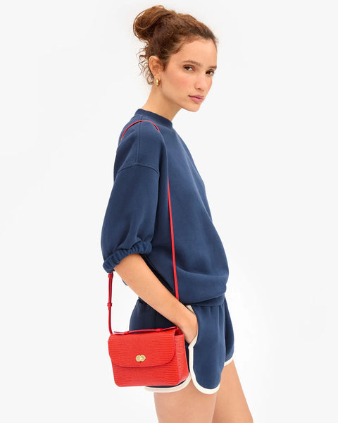 Clare V Kathryn Red Embossed Bag - Back View Showing Back Pocket and Adjustable Crossbody Strap