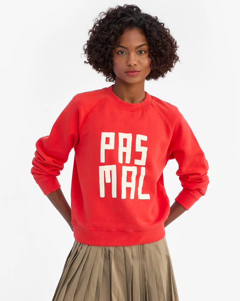 Signature red sweatshirt with Pas Mal text on front. Made from 100% cotton.