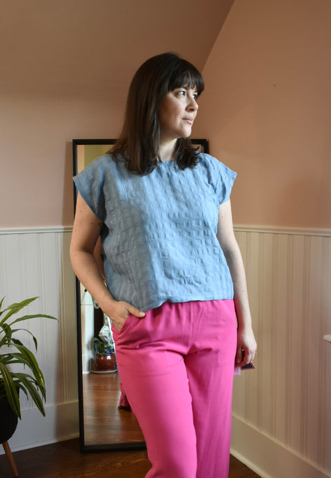 Blue linen viscose breezy blouse relaxed fit front view.