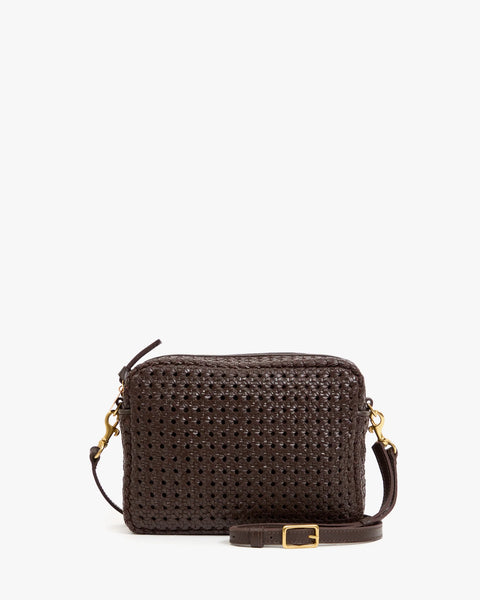 Close-up of Clare V chocolate rattan woven leather texture on Midi Sac – artisan rattan leather purse detail