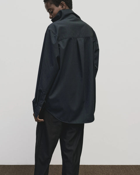 Asymmetric Striped collar Shirt in navy by Mijeong Park. exaggerated funnel neck and asymmtrical button front - big and baggy oversized fit
