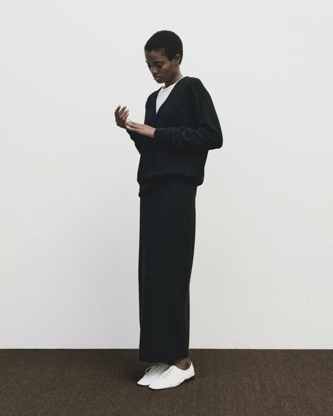 Merino cashmere long skirt in black, elastic waist, back slit, straight fit by Mijeong Park