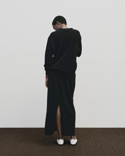 Merino cashmere long skirt in black, elastic waist, back slit, straight fit by Mijeong Park