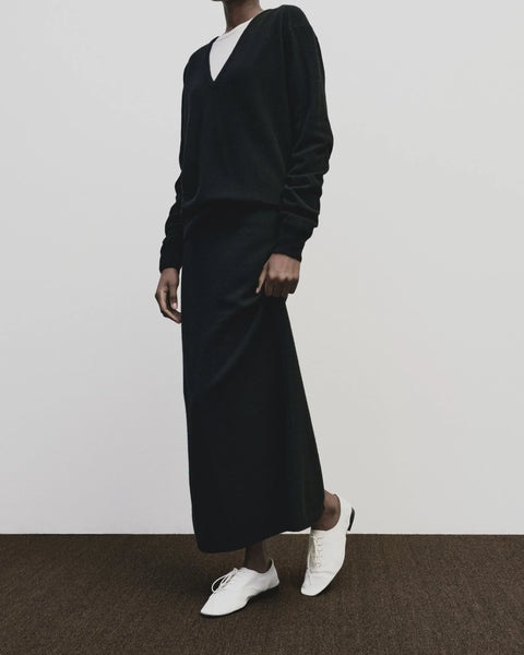 merino wool, blended with a touch of cashmere for an extra-luxe fabric, relaxed fit, v-neck, long sleeve sweater ribbed trim. Mijeong Park Cashmere sweater in black