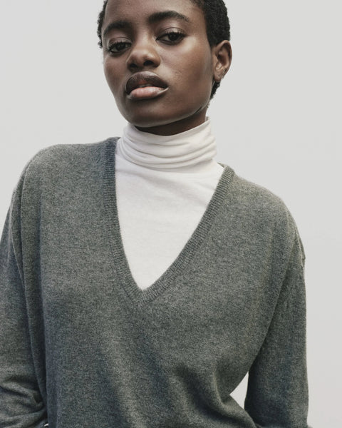 merino wool, blended with a touch of cashmere for an extra-luxe fabric, relaxed fit, v-neck, long sleeve sweater ribbed trim