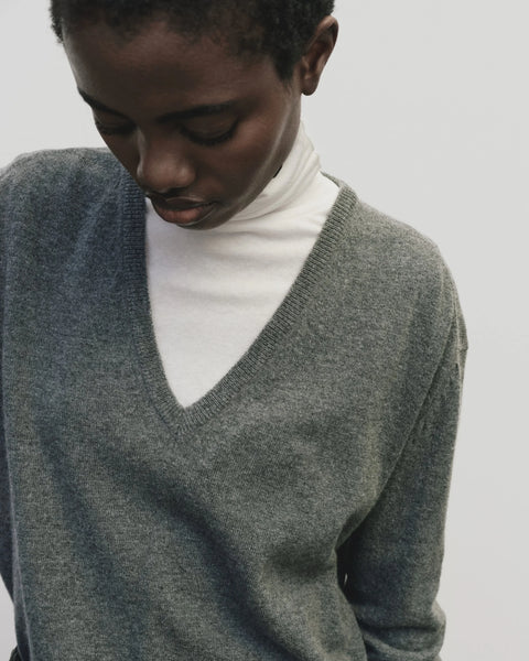merino wool, blended with a touch of cashmere for an extra-luxe fabric, relaxed fit, v-neck, long sleeve sweater ribbed trim