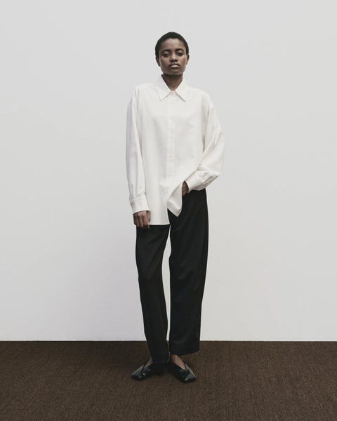 textured cotton blend, relaxed fit, features additional side buttons at the waist. Collar. Oversized fit Mijeong Park