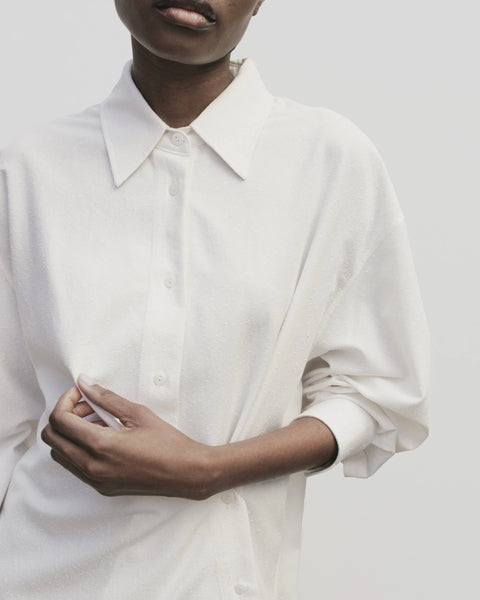 textured cotton blend, relaxed fit, features additional side buttons at the waist. Collar. Oversized fit Mijeong Park