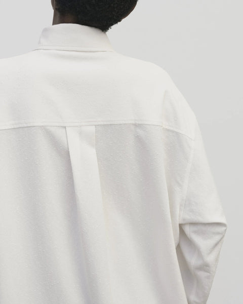 textured cotton blend, relaxed fit, features additional side buttons at the waist. Collar. Oversized fit Mijeong Park
