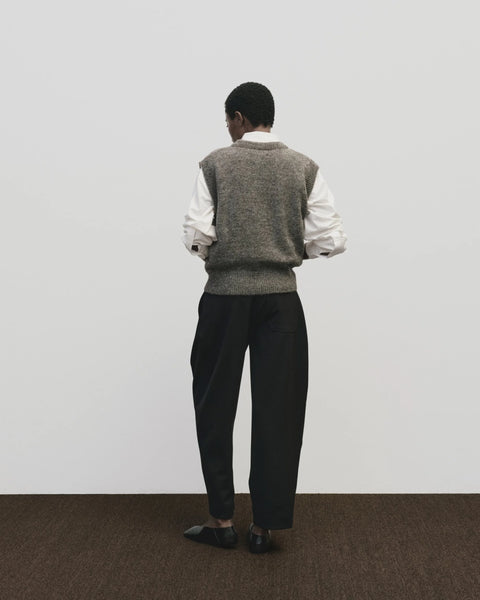 Classic sweater vest, in a relaxed oversized fit, wool blend, V neck with ribbed trims. Mijeong Park Wool Blend V-Neck Vest in Heather Brown