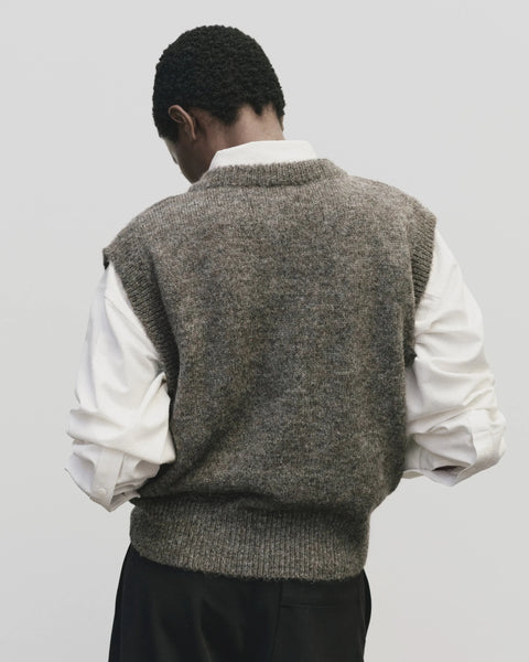 Classic sweater vest, in a relaxed oversized fit, wool blend, V neck with ribbed trims. Mijeong Park Wool Blend V-Neck Vest in Heather Brown
