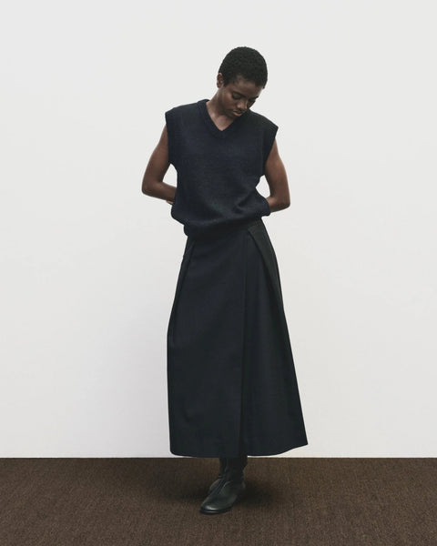 Classic sweater vest, in a relaxed oversized fit, wool blend, V neck with ribbed trims. Mijeong Park Wool Blend V-Neck Vest in Navy