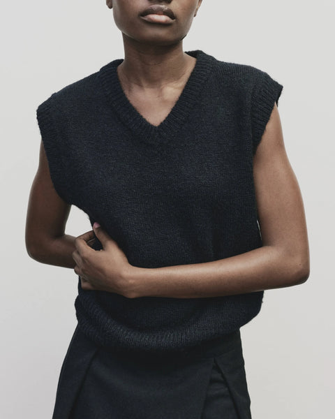 Classic sweater vest, in a relaxed oversized fit, wool blend, V neck with ribbed trims. Mijeong Park Wool Blend V-Neck Vest in Navy