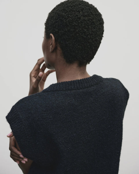 Classic sweater vest, in a relaxed oversized fit, wool blend, V neck with ribbed trims. Mijeong Park Wool Blend V-Neck Vest in Navy