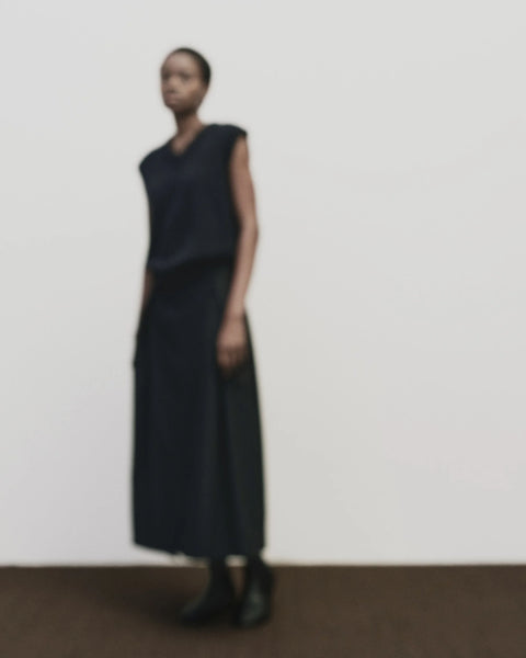 Classic sweater vest, in a relaxed oversized fit, wool blend, V neck with ribbed trims. Mijeong Park Wool Blend V-Neck Vest in Navy