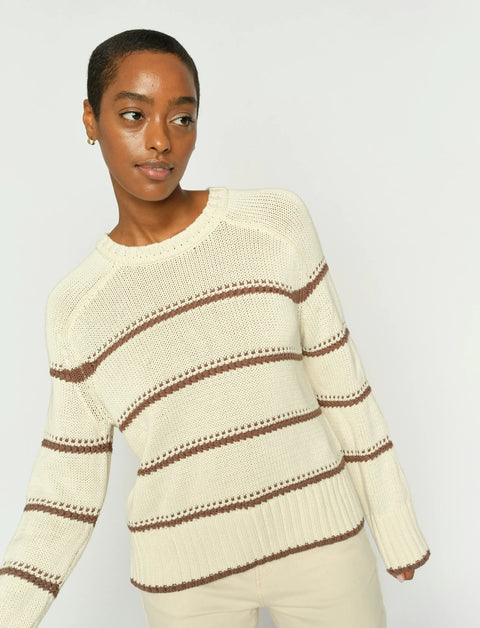 A regular-fit, long-sleeve crewneck knit sweater by Mos Mosh, crafted from 100% organic cotton and featuring a timeless nautical-inspired horizontal stripe pattern with ribbed trim.