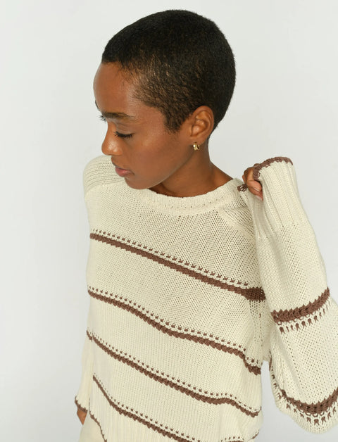 A regular-fit, long-sleeve crewneck knit sweater by Mos Mosh, crafted from 100% organic cotton and featuring a timeless nautical-inspired horizontal stripe pattern with ribbed trim.