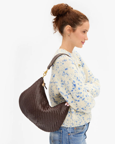 Clare V Moyen Messenger in Chocolate Handwoven Zig-Zag leather – zip top crescent bag styled on model with crossbody strap