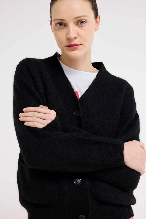 V neck cardigan in black, made by Our Sister. Wool Cardigan, womens. 4 button, relaxed fit.