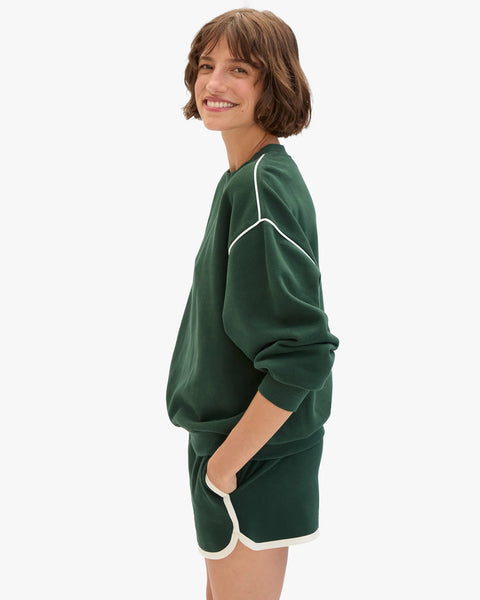 Clare V forest green sweatshirt styled with matching Le Jogging Short – co-ord lounge set with geo embroidery detail
