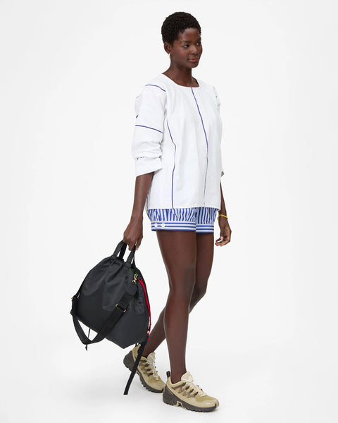 Clare V Sac Tout Black - Back View Showing Backpack Straps and Green Recycled Nylon Twill Lining Detail
